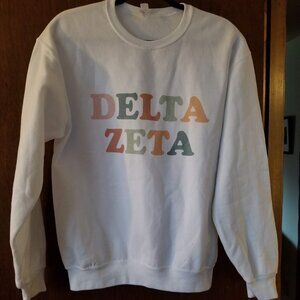 Delta Zeta Groovy Letters Crewneck